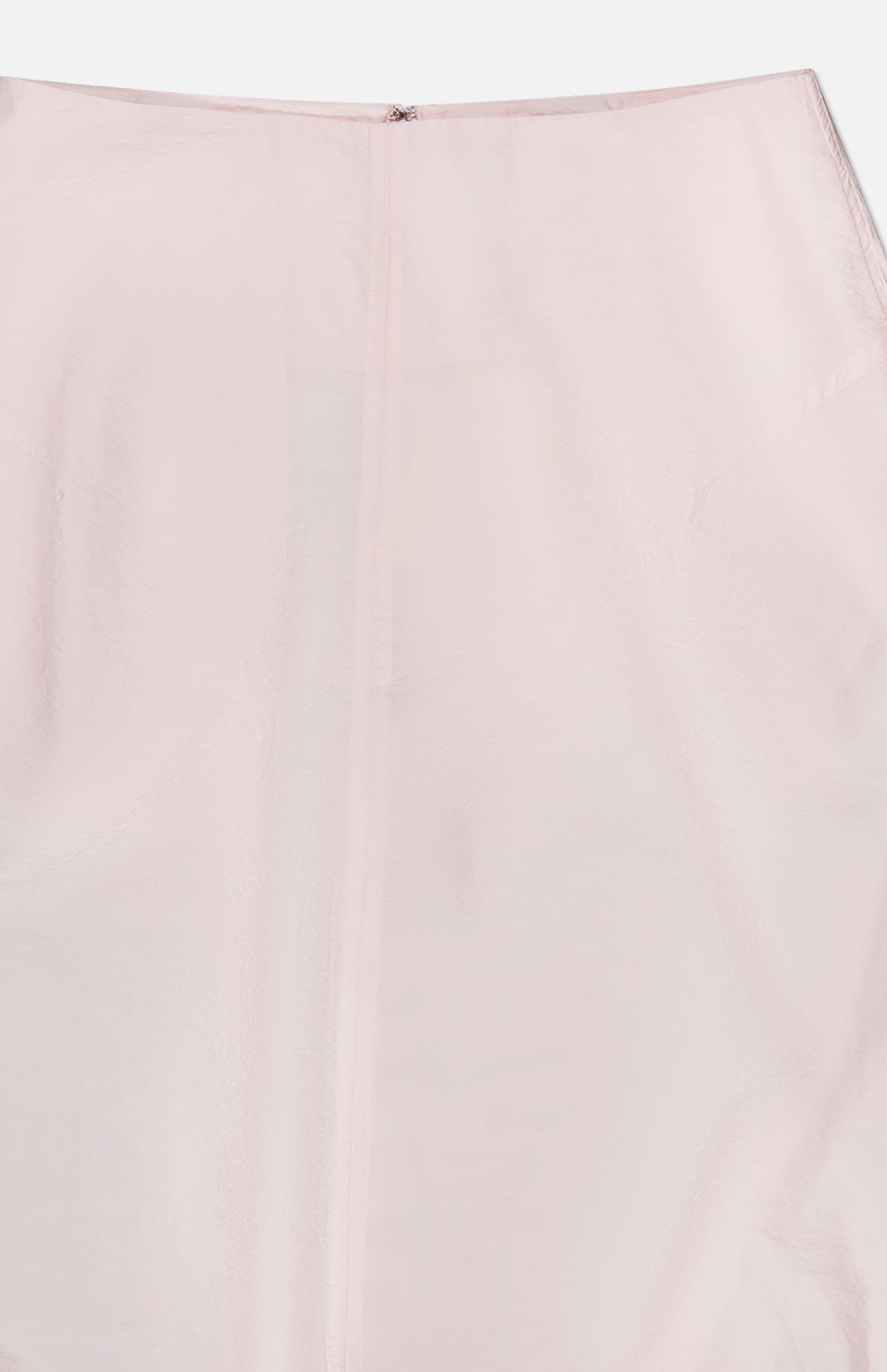 A close-up of TOTEME's Silk-blend Parachute Skirt in pale pink, featuring semi-sheer fabric, a central vertical seam, and a top zipper.
