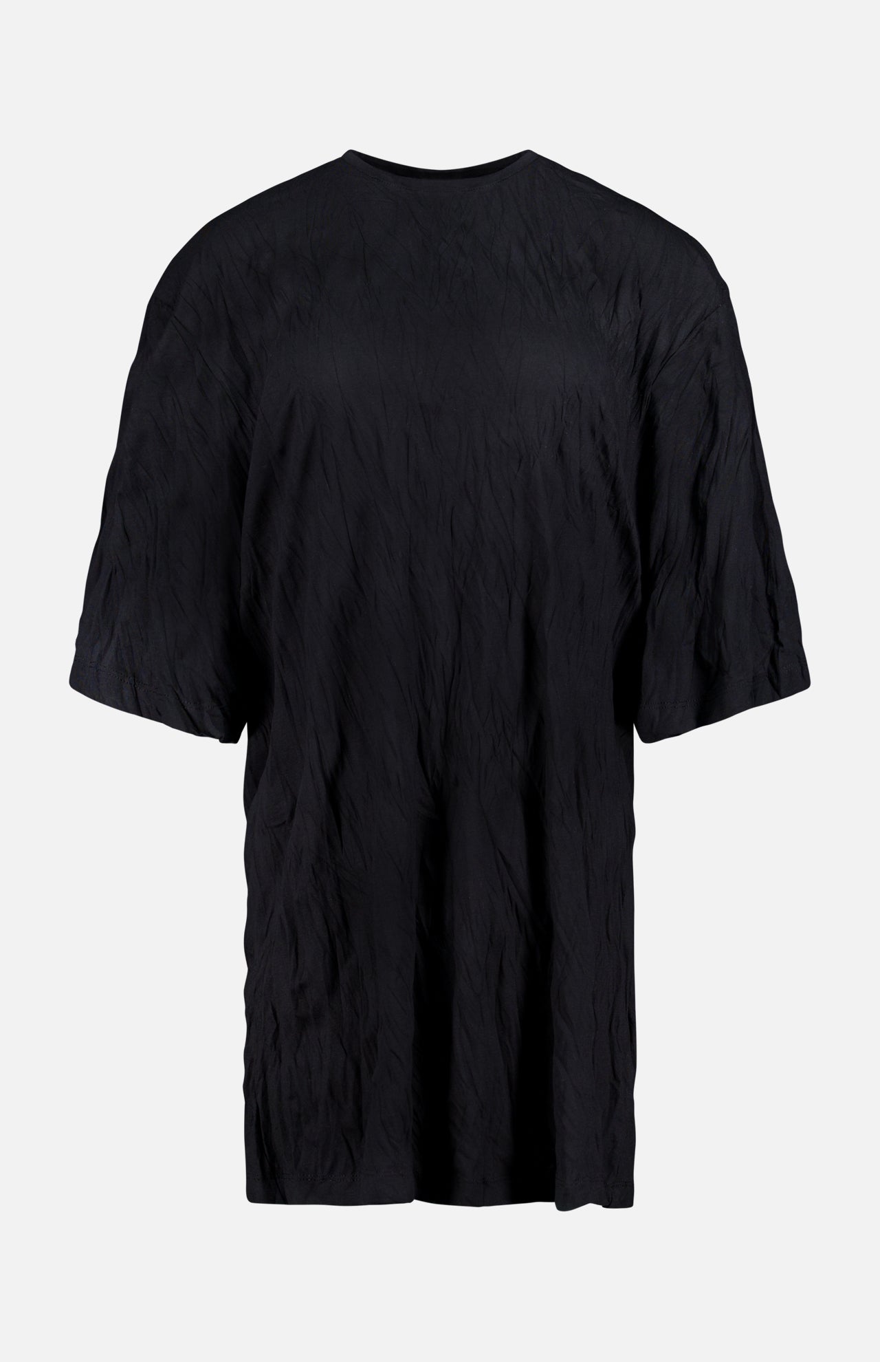 The TOTEME Relaxed Crinkle T-shirt Dress is an oversized black dress made from textured jersey, shown against a plain white background.