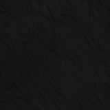 A close-up of the TOTEME Relaxed Crinkle T-shirt Dress in black, lying flat with visible crinkles and a small white tag by the collar.