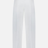 Back view of TOTEME’s Single Pleat Cotton Trouser Pants in white, featuring belt loops, two buttoned back pockets, and crisp straight legs.