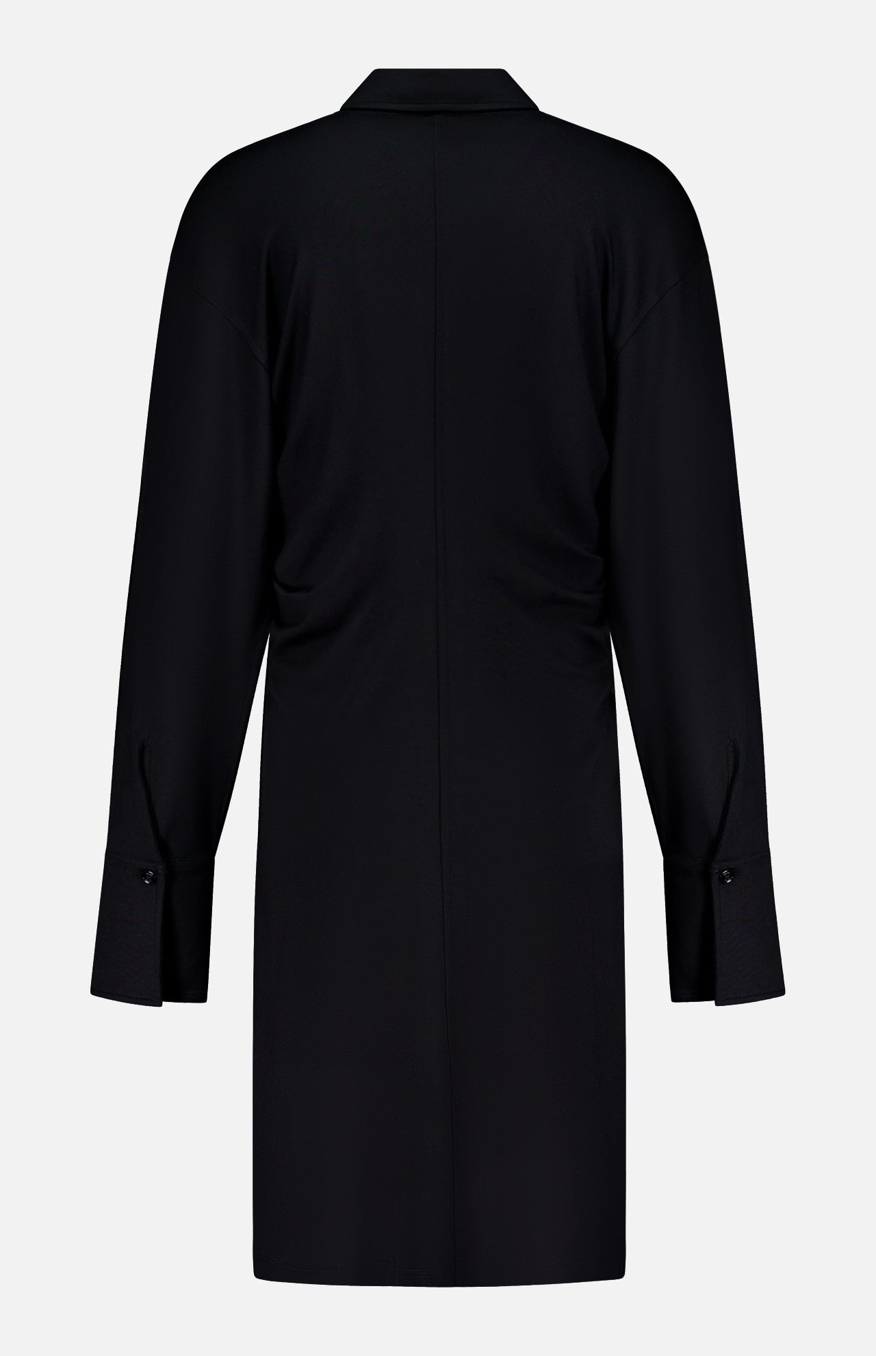 Back view of the TOTEME Slouch Jersey Shirt Dress, a long-sleeved, knee-length black piece with a straight cut, buttoned cuffs, and a simple collar, shown against a plain white background.