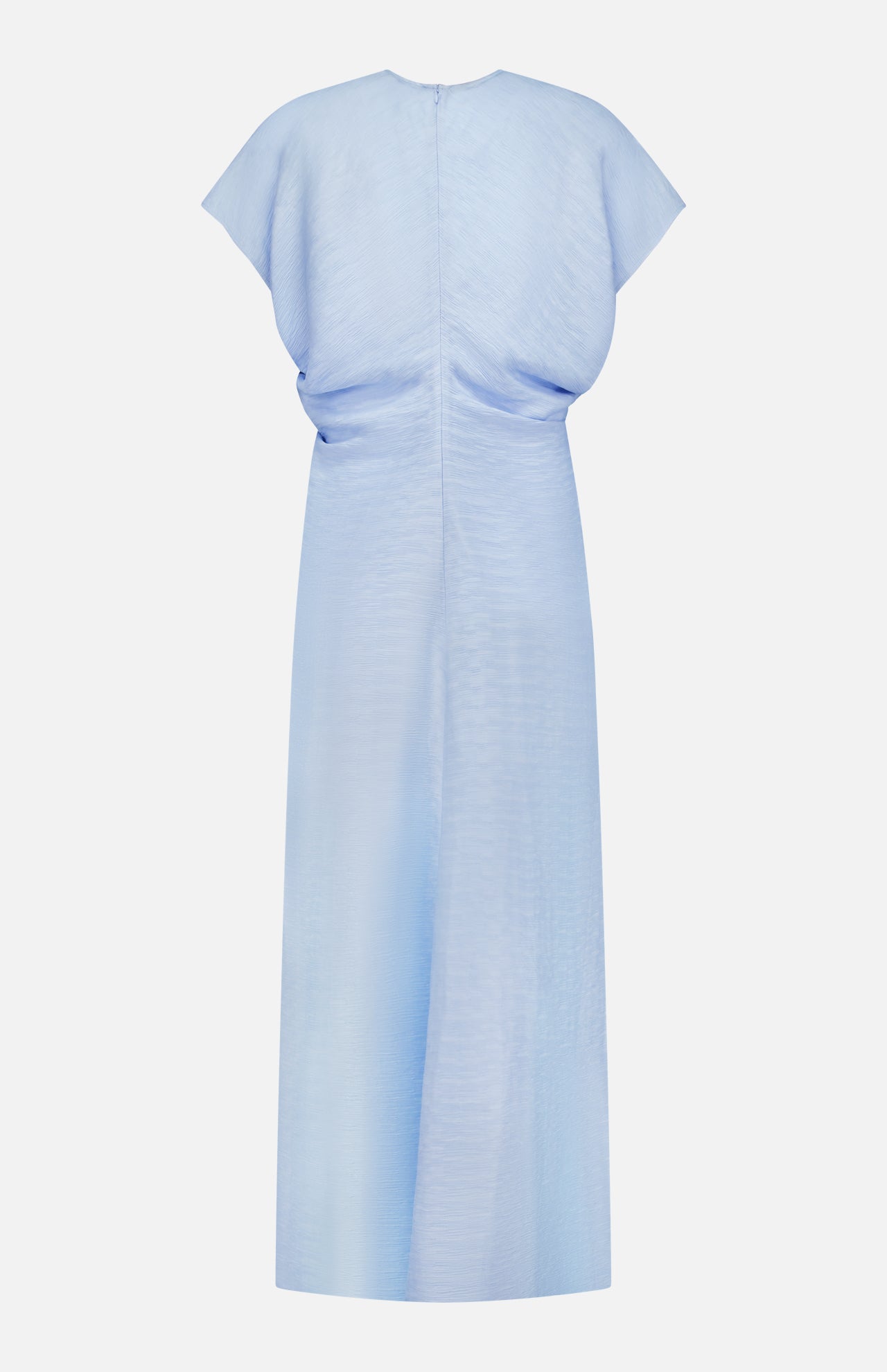 The Slouch Waist Dress by TOTEME is displayed from the back in pale blue, with a textured fabric, short sleeves, high neckline, and relaxed cinched waist. Curved panels enhance the design to a floor-length hem.