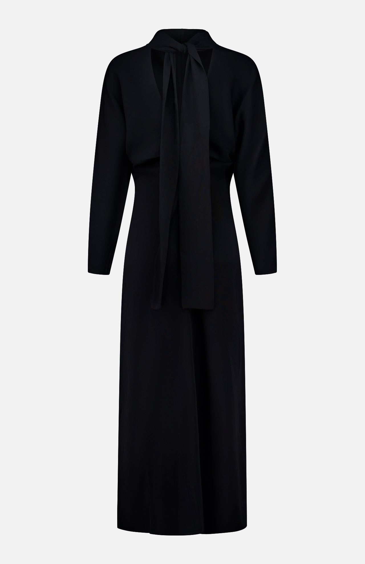 The TOTEME Slouch Waist Scarf Dress is a long-sleeve black midi dress featuring voluminous sleeves, a keyhole neckline with a wide matching necktie detail, and a fitted waist with a straight skirt, shown against a plain white background.