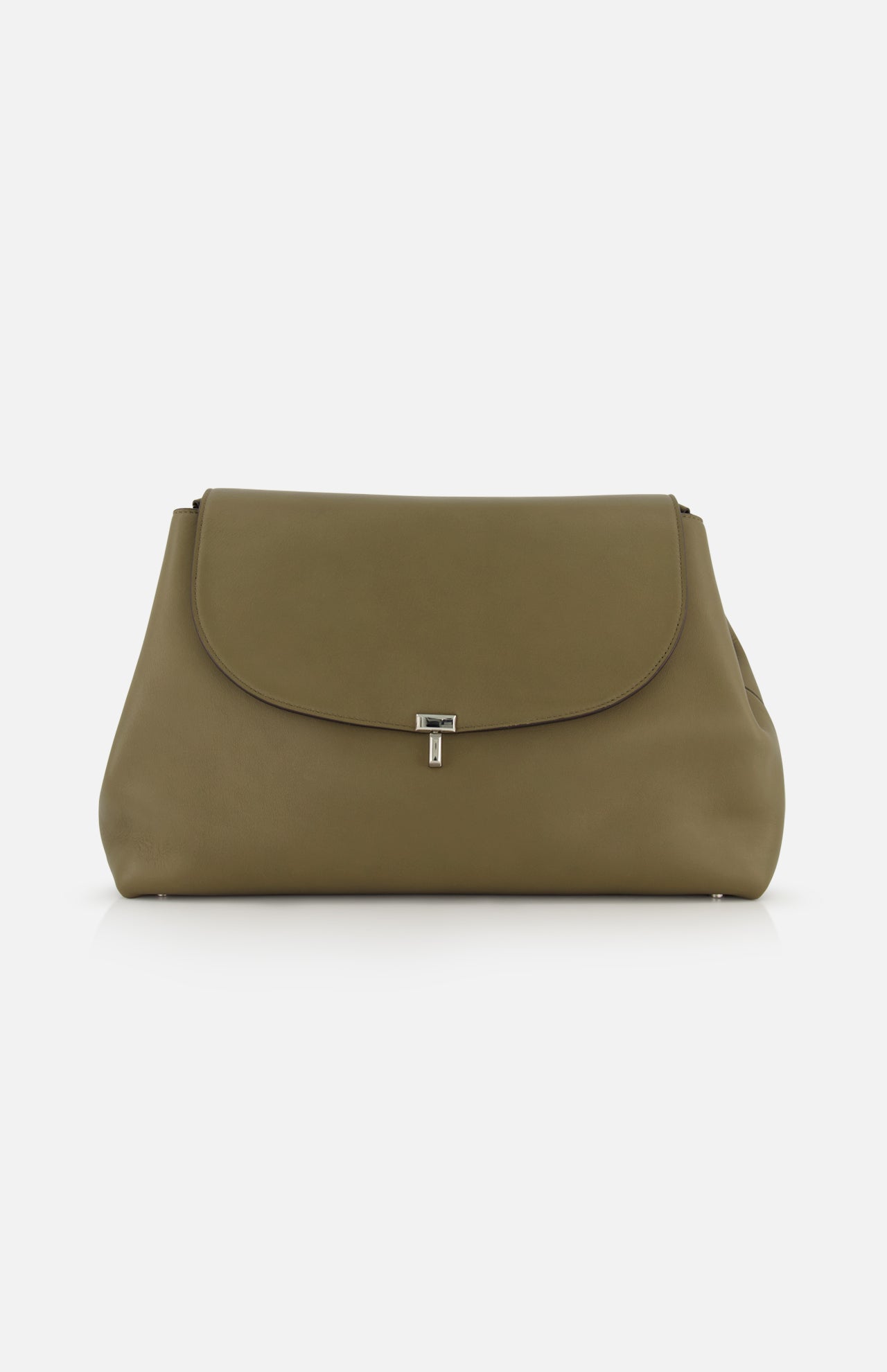 The TOTEME T-Lock Leather Satchel Bag is a large olive green leather bag with a curved flap, small silver center clasp, smooth minimalist design, and adjustable strap, shown against a plain white background.