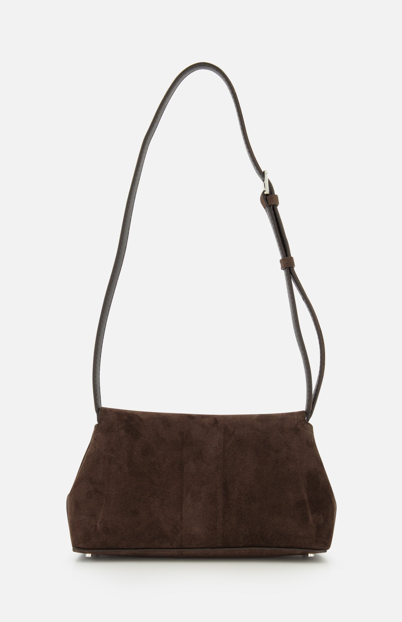 The TOTEME T-Lock Suede Clutch is a dark chocolate brown suede shoulder bag with a wide base, softly structured body, and an adjustable strap—crafted in Italy—and displayed against a plain white background.