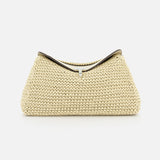 The TOTEME T-Lock Woven-Leather Clutch Bag features cream-colored woven leather, a structured trapezoidal shape, black top trim, and sculptural design. Made in Italy, it's photographed against a plain white background.