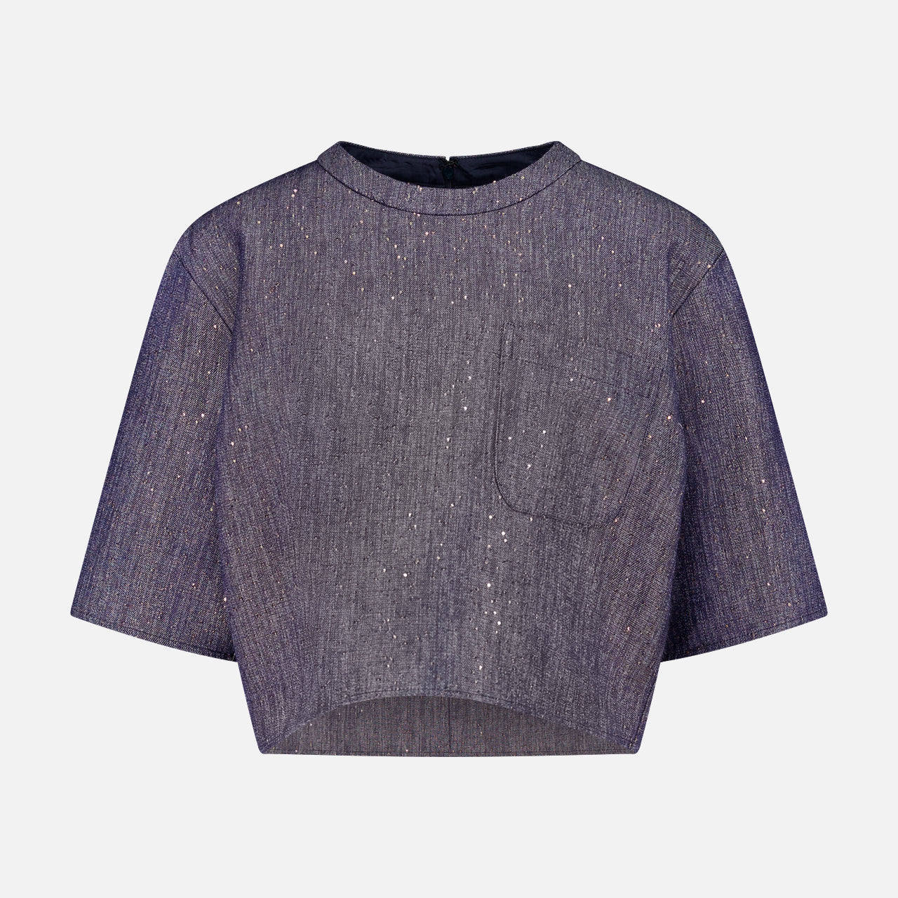 The TWP Ex Cropped Sequin Denim T Shirt features a short-sleeved, boxy silhouette in shimmery dark gray with a round neckline and small chest pocket, shown against a plain light background.