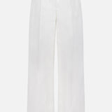The Hudson St Trouser Pant by TWP is a white high-waisted, wide-leg pant with subtle vertical pinstripes, belt loops, concealed front closure, and crisp crease detailing.