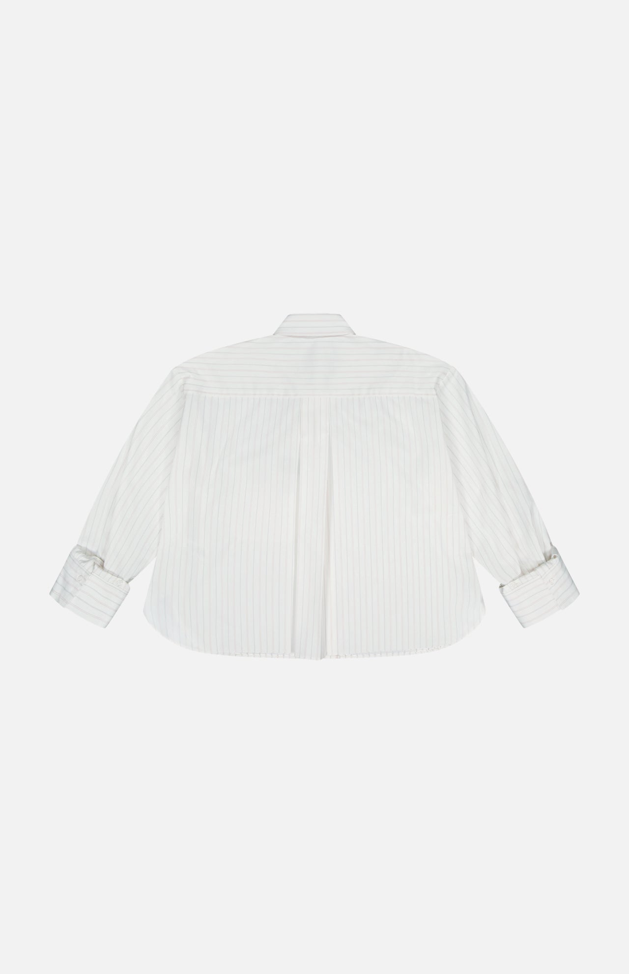 The TWP J.D. Shirt is a women's cropped cotton shirt in white with subtle vertical stripes and rolled-up cuffs, displayed from the back against a plain white background.