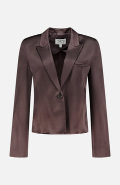 The Sawyer Shiny Cropped Blazer by TWP is a chocolate brown satin blazer with long sleeves, a notched lapel, chest pocket, and single front button closure—an ideal versatile workwear piece for women, shown on a plain white background.