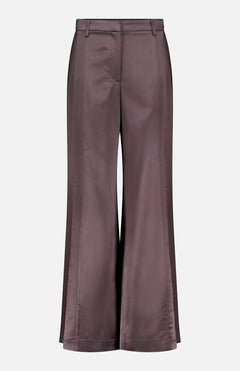 The Taite Slit Hem Pant by TWP features a high-rise, wide-leg silhouette in lustrous mauve wool satin with belt loops, front seams, and a subtle hem flare, shown against a plain white background.