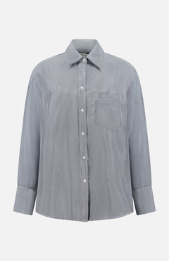 The TWP Big Joe Glossy Stripe Shirt is a women's oversized, long-sleeve button-up in light gray with subtle vertical stripes, a chest pocket, and classic collar—ideal for workwear and shown on a white background.