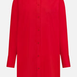 The TWP Big Joe Oversized Shirt Dress in bright red features long sleeves, a pointed collar, left chest pocket, and a relaxed fit for versatile women’s workwear. Shown against a white background.