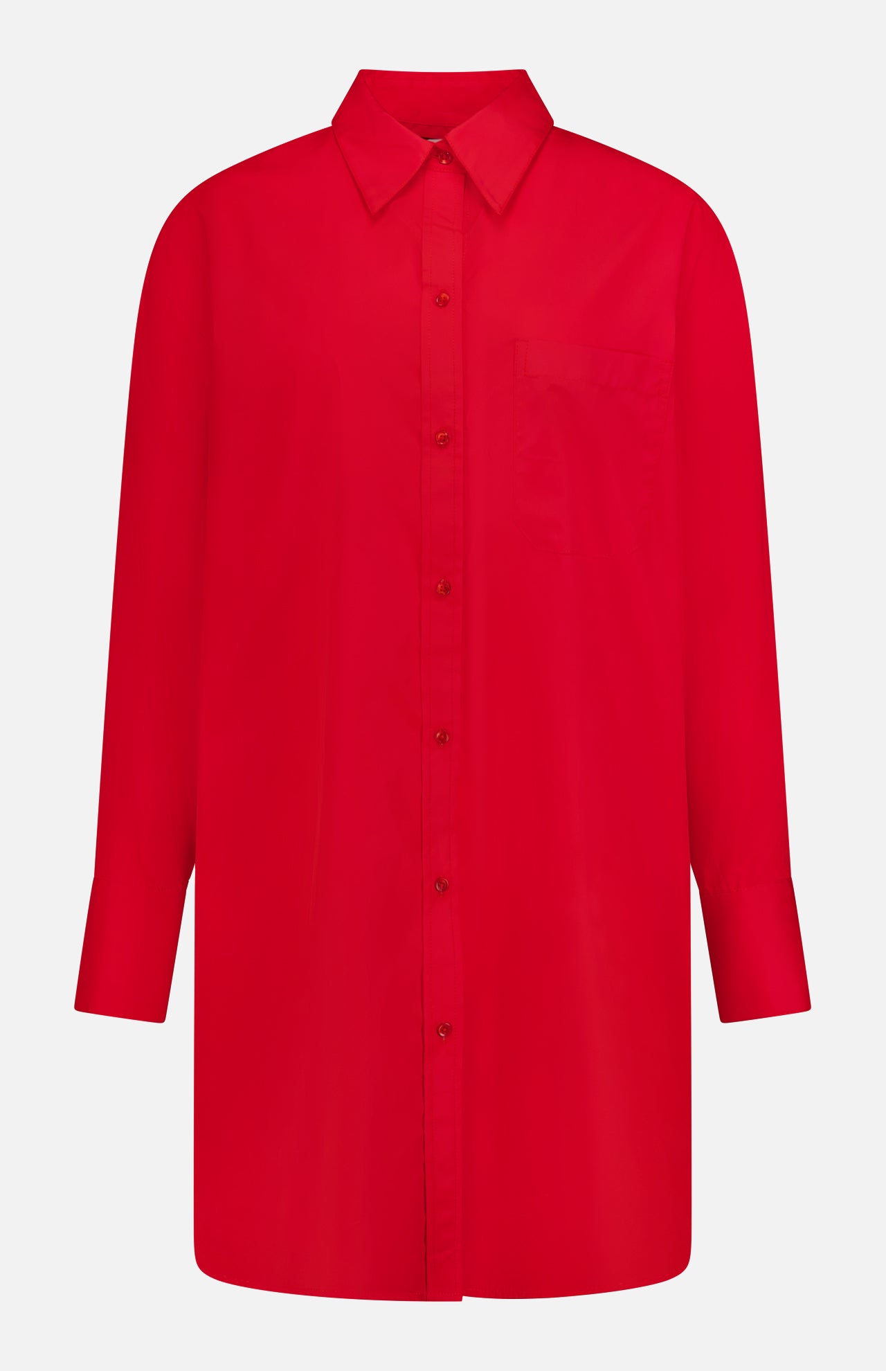 The TWP Big Joe Oversized Shirt Dress in bright red features long sleeves, a pointed collar, left chest pocket, and a relaxed fit for versatile women’s workwear. Shown against a white background.