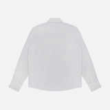 The Cowboy Update Relaxed Fit Shirt by TWP is shown from the back, featuring a crisp collar and buttoned cuffs against a white background—an essential women's workwear staple.