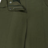 The Demie Wide Leg Trouser Pant by TWP is shown in olive green, displayed from the waist to mid-thigh with the fly unzipped and unbuttoned to reveal the inner waistband, pockets, and fastening details.
