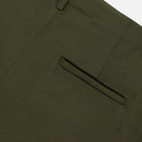 Close-up of the back pocket and waistband of the TWP Demie Wide Leg Trouser Pant in dark green, expertly crafted from a soft viscose linen blend. The image highlights a single welt pocket and belt loop, set against a plain white background—an ideal choice for those seeking refined wide-leg workwear.