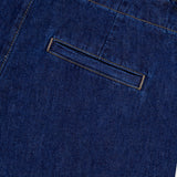 Close-up of the back pocket area of TWP’s Dillon Denim Jeans in Dark Stone, highlighting the high rise fit and single welt pocket with visible stitching.