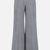 Back view of Dillon Glossy Stripe Pants by TWP, featuring a gray striped texture, high-rise wide-leg cut, belt loops, and a single right back pocket—ideal for stylish, comfortable women's workwear.