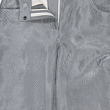 Close-up of TWP Dillon Glossy Stripe Pants—a high-rise, wide-leg style with blue-and-white stripes, open zipper, and visible white pocket lining—ideal and versatile workwear for women.