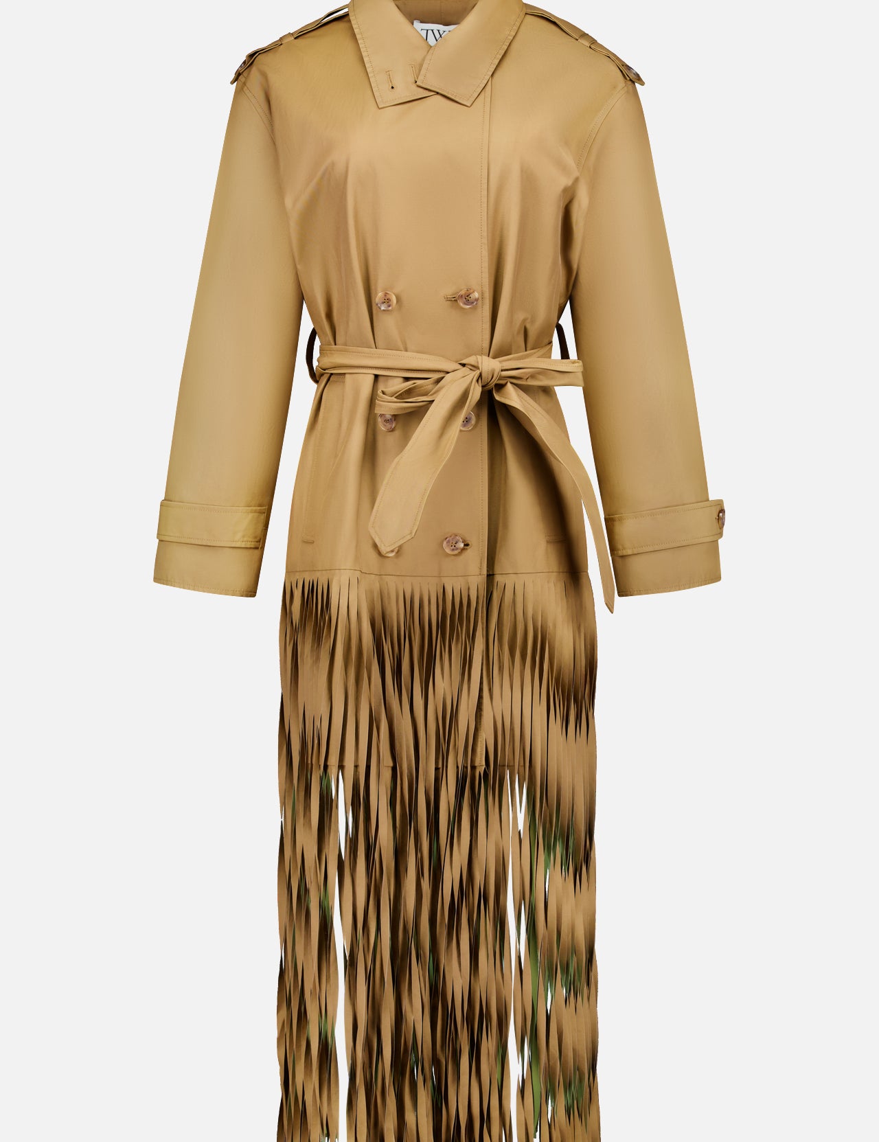 The TWP Fringe Benefit Jacket is a tan, long-sleeve trench coat with a waist belt, double-breasted buttons, and fringe accents below the knees for a stylish women’s workwear look with flowing cut-out details.
