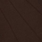 Close-up of a dark brown TWP Funnel Neck Sleeveless Dress featuring prominent diagonal seams.