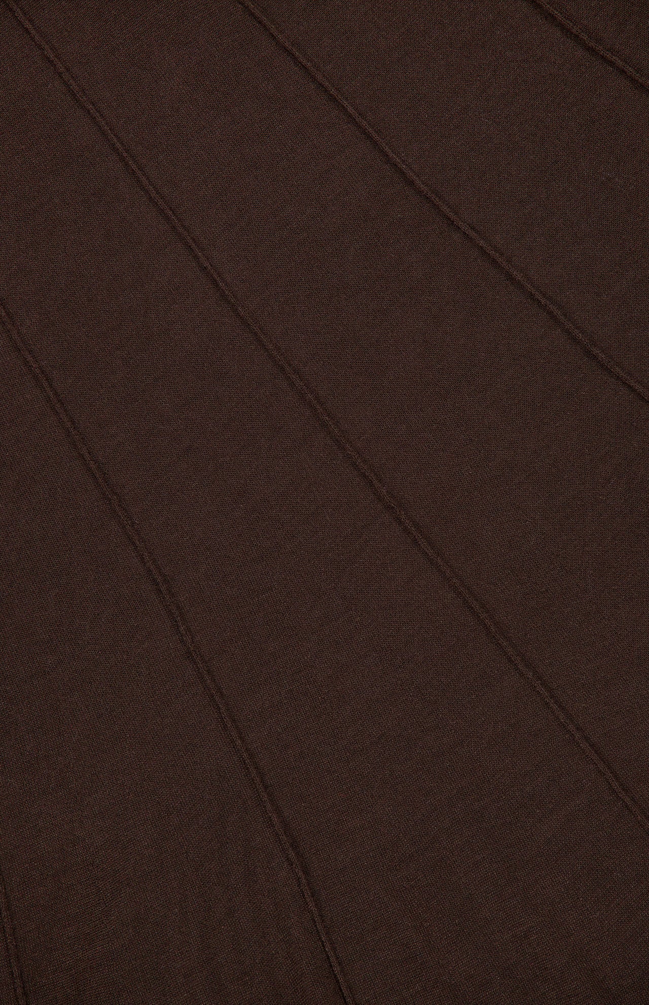 Close-up of a dark brown TWP Funnel Neck Sleeveless Dress featuring prominent diagonal seams.