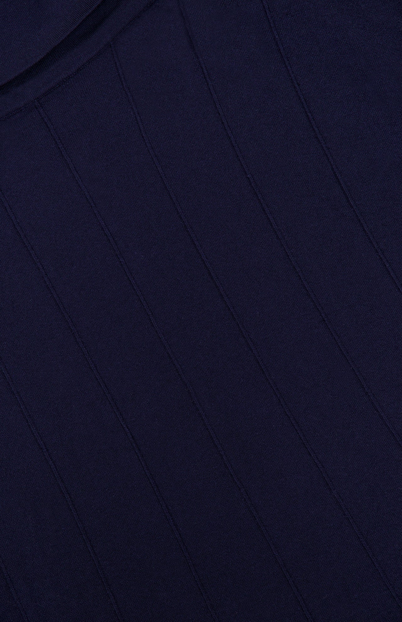 Close-up of a dark navy blue ribbed fabric with vertical textured lines, featured in the TWP Funnel Neck Sleeveless Top—an ideal choice for women’s workwear.