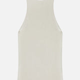 The Harbor Racerback Tank Top by TWP is shown laid flat, viewed from the back, featuring a beige ribbed design with a racerback cut and no visible logos or patterns.