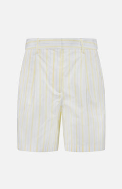 The TWP Henry St Striped Shorts feature yellow and white vertical stripes, pleats, belt loops, and a tailored mid-rise fit—ideal for stylish women’s workwear. Displayed on a plain white background.