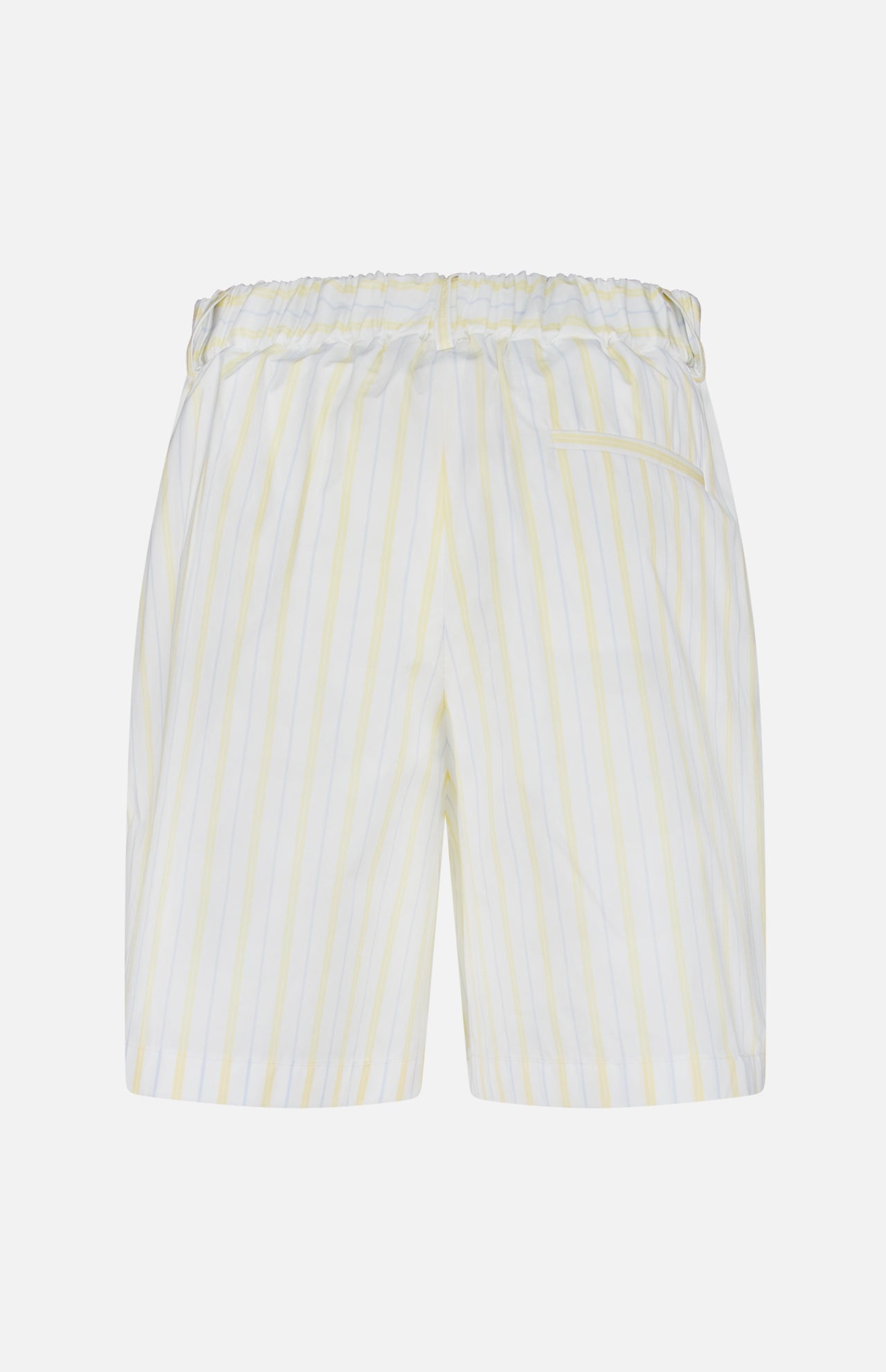 Back view of the TWP Henry St Striped Shorts, featuring light yellow vertical stripes, an elastic waistband, a right-side back pocket, and a classic workwear-inspired design.
