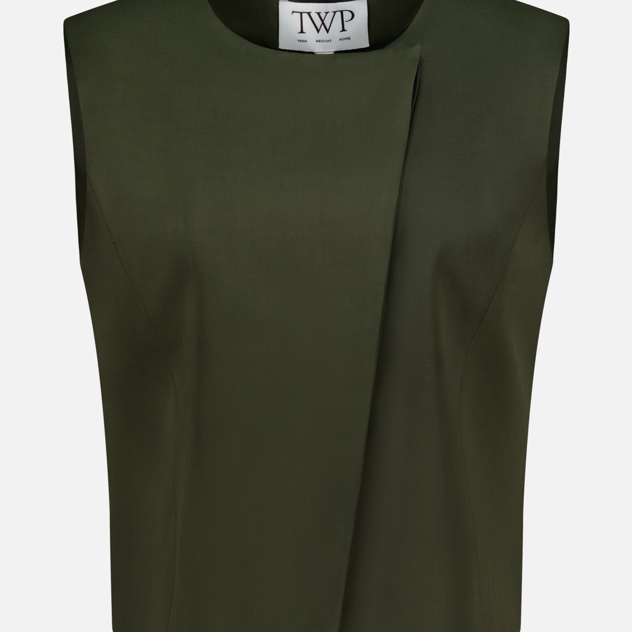 The High Neck Hidden Placket Vest by TWP is a sleeveless, dark olive green cropped top designed in a minimalist style. It features an asymmetrical front fold, round neckline, and a visible white label with the brand’s name inside. Ideal for women seeking refined yet contemporary workwear, this modern vest is photographed against a plain white background.