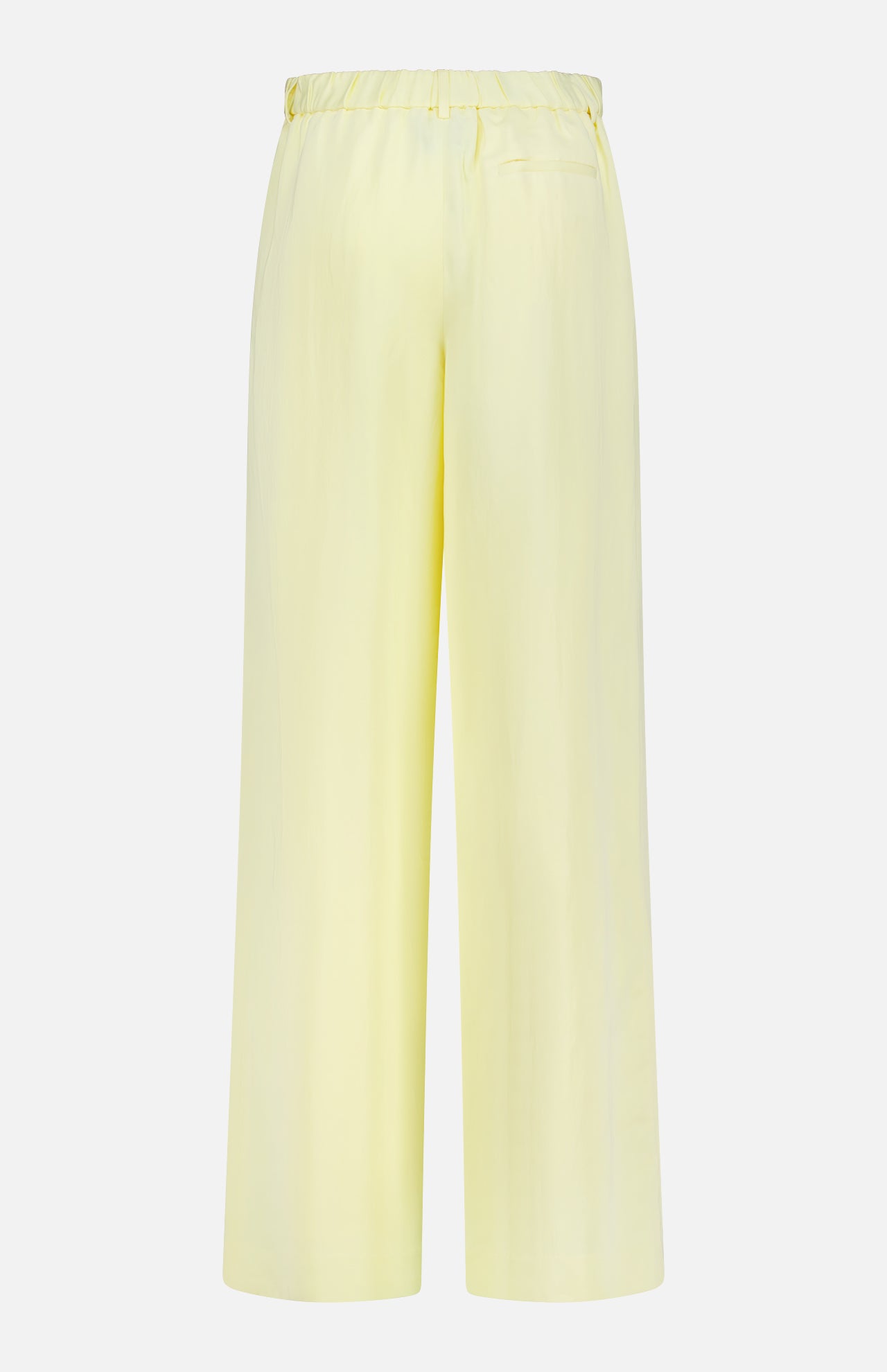 The Hudson St Pleated Pant by TWP is a wide-leg, high-waisted yellow trouser with an elastic waistband and single back pocket, shown from the back on a white background—a relaxed workwear option for women.