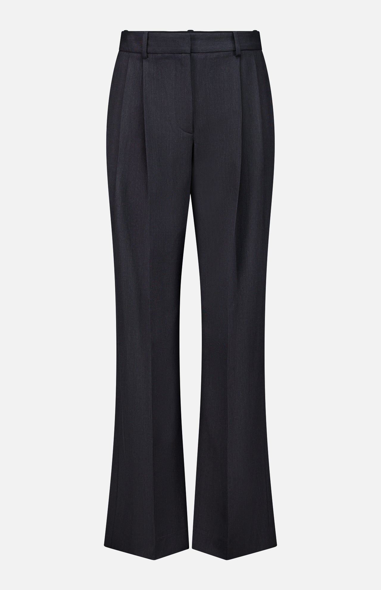 The Ivy Pleated Trouser Pant by TWP showcases a sophisticated workwear option for women, featuring black tailored pants with belt loops, front pleats, and a slight flare at the hem in a mid-rise silhouette, all presented against a plain white background.