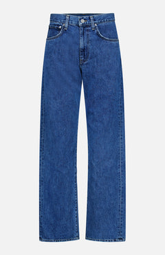 The TWP Kent St Jean in Paris is a pair of classic blue denim jeans featuring a timeless 5-pocket design, high waist, button closure, and straight wide legs, displayed on a plain white background.