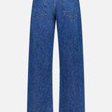 The Kent St Jean in Paris by TWP is a pair of blue wide-leg jeans, shown from the back against a white background, featuring a high waist and a classic 5-pocket design with two rear pockets.