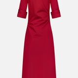The TWP New Earl Wrap Front Dress is a knee-length, collared red shirt dress with elbow-length folded-cuff sleeves, shown from the back on a white background—stylish, comfortable workwear for women.