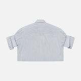 The TWP Next Ex Striped Cropped Blouse features blue stripes, a boxy cropped fit, short sleeves, and a collar. It's shown from the back laid flat against a white background.
