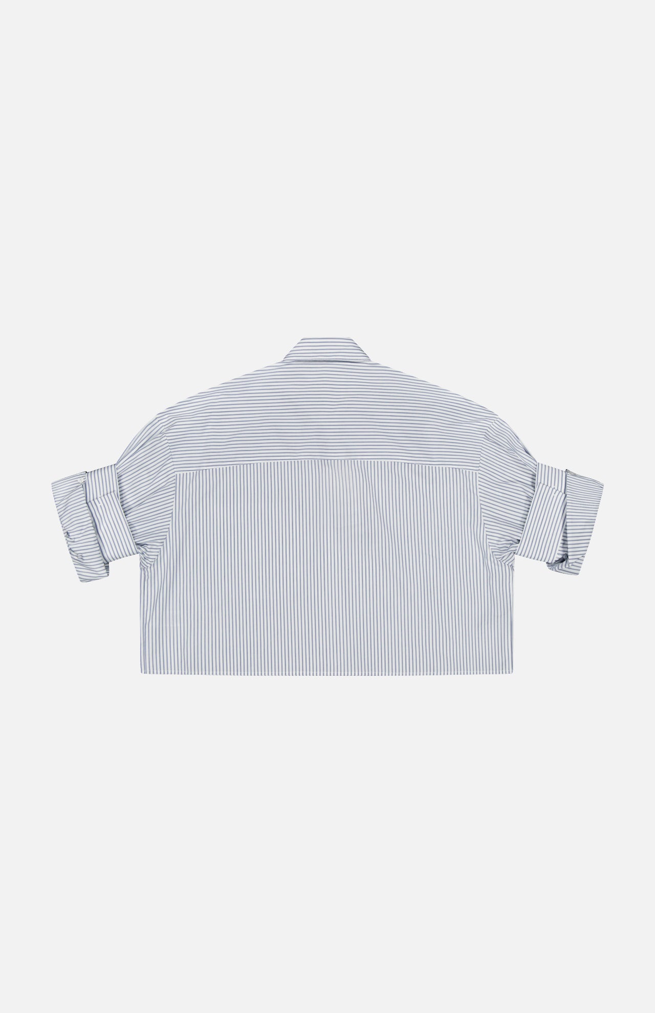 The TWP Next Ex Striped Cropped Blouse features blue stripes, a boxy cropped fit, short sleeves, and a collar. It's shown from the back laid flat against a white background.