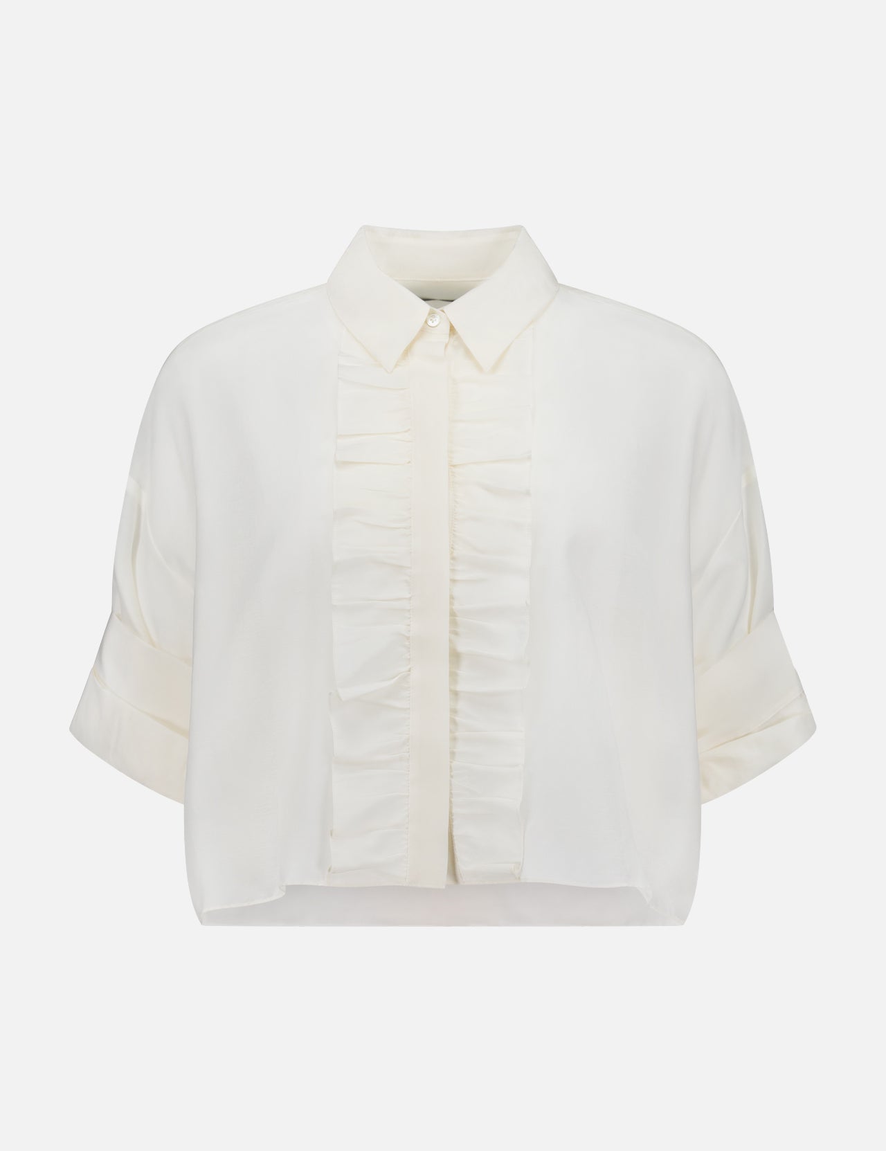 The TWP Next Ex Ruffle Blouse is a short-sleeved, white cropped blouse with a classic collar, front button placket, vertical ruffles, rolled cuffs, and a slightly cropped hem—an ideal versatile workwear choice for women.