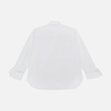 The TWP Next Morning Oversized Shirt, crafted from premium Italian cotton, is shown from the back with a classic collar and tied cuffs. This office-chic piece is laid flat on a white background.