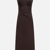 The TWP On the Side Stretch Silk Dress is a sleeveless dark brown satin dress with a fitted waist, subtle side draping, and an asymmetric neckline, shown against a plain white background.