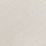 Close-up of a textured off-white fabric with an irregular pattern from the Raw Hem Shell Top by TWP. A white zipper blends subtly into the material at the top left, highlighting details ideal for a women’s tank.