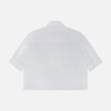 Back view of the TWP Short Lived Placket with Cherry Pleats Shirt—a crisp white, short-sleeve collared poplin top—shown on a white background, perfect for elevating women's workwear essentials.