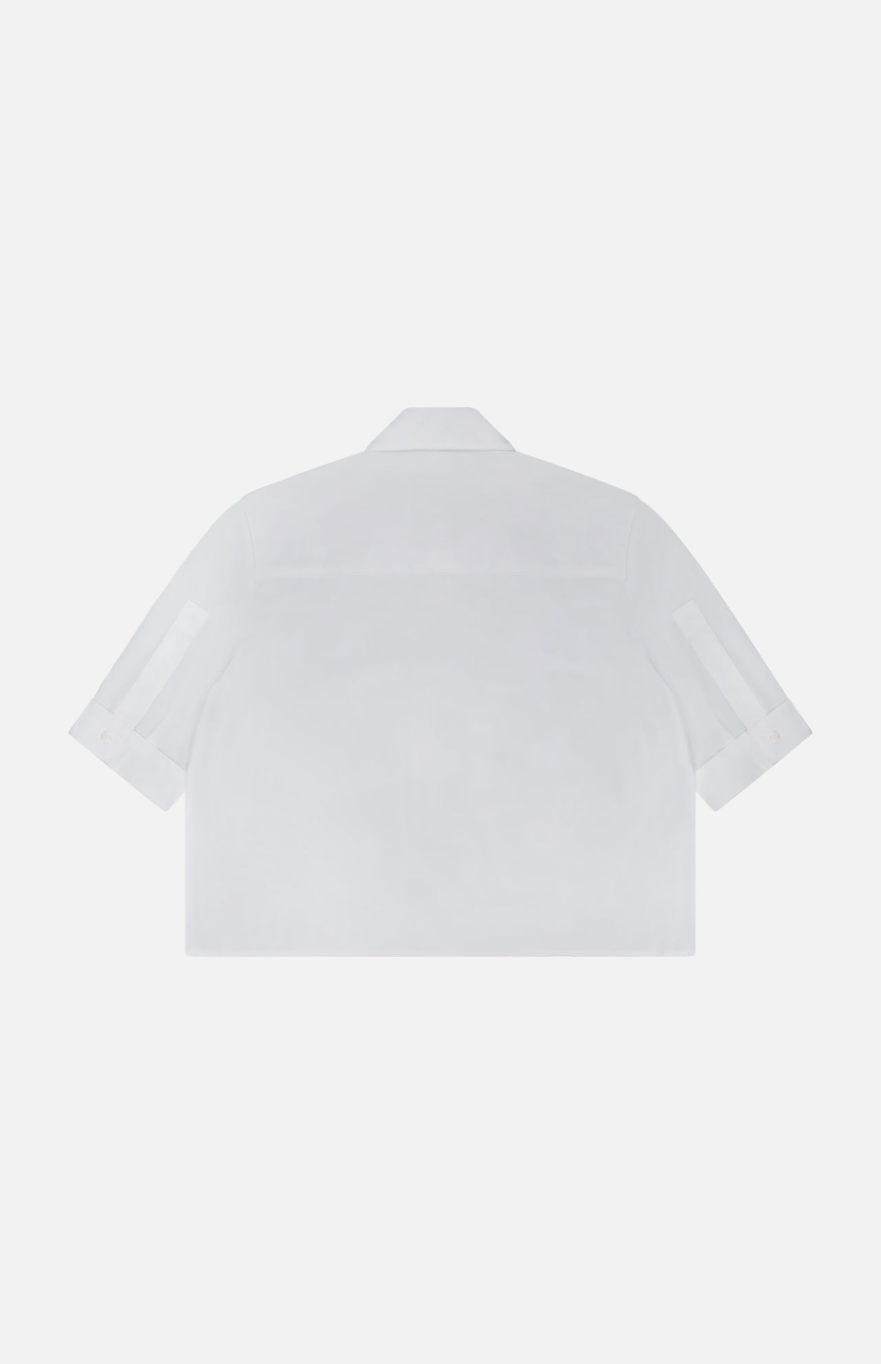 Back view of the TWP Short Lived Placket with Cherry Pleats Shirt—a crisp white, short-sleeve collared poplin top—shown on a white background, perfect for elevating women's workwear essentials.