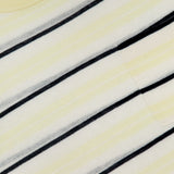 Close-up of the TWP Striped Short Sleeve T-shirt for women in light yellow and white stripes with thin black lines, a chest pocket, and a neck tag—ideal for a chic striped workwear look.