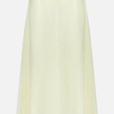 The A-Line Linen Skirt by TWP is a light yellow, high-waisted A-line midi made from soft, semi-sheer linen—an elegant women’s workwear piece shown on a plain white background.