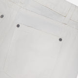 Close-up of the back pocket on the TWP West 11th St Pant in linen-cotton denim, featuring stitching details, belt loops, and metal rivets for a durable women's workwear style.