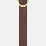 Introducing the Wide Leather Belt by TWP—a women's brown leather belt featuring neat stitching and a large, oval gold buckle. Photographed vertically against a white background, this wide designer accessory effortlessly elevates any luxury workwear ensemble.