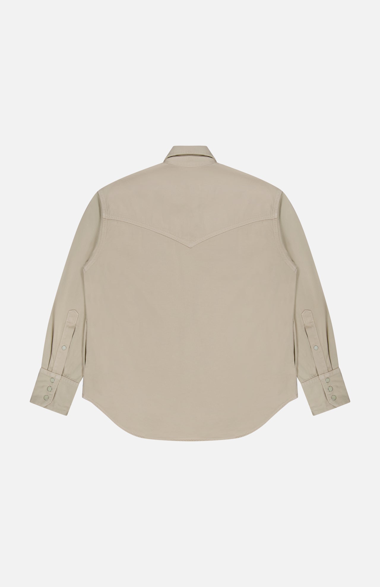 The Yellowstone Western Blouse by TWP is displayed from the back, featuring a beige color, long sleeves with buttoned cuffs, a pointed yoke detail, and is laid flat on a white background.